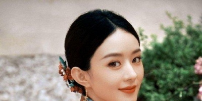 赵丽颖穿橘色旗袍明艳又温柔 拿小扇温婉大气如画中美人